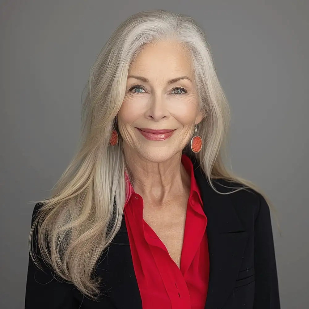 Portrait of a smiling woman with silver hair